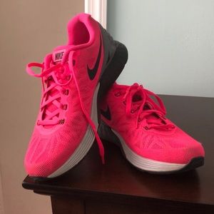 Pink nike running shoes